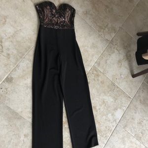 City vibe embellished jumpsuit in black size 3